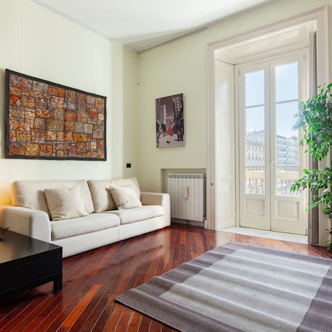 Plan which Milan attractions you'll visit over coffee in the living room