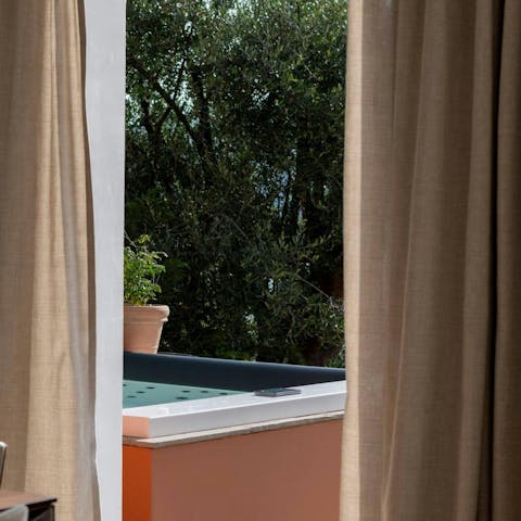 Enjoy a long sunset soak in the private hot tub