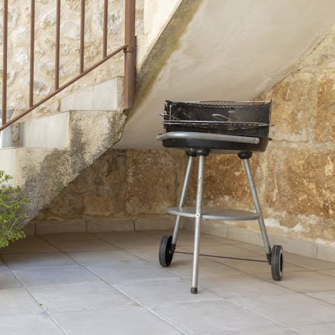 Fire up the barbecue to grill some Spanish sausages to eat by the pool