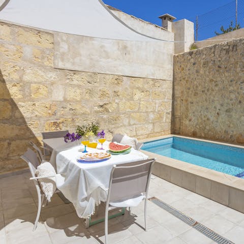 Tuck into tasty tapas and paella around the alfresco dining table