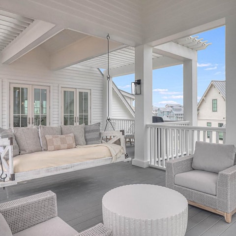 Savour laid back drinks and games on the covered porch