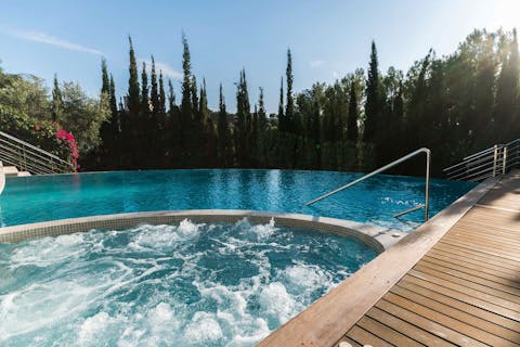 Soak sore muscles in the Jacuzzi or swim in the infinity pool
