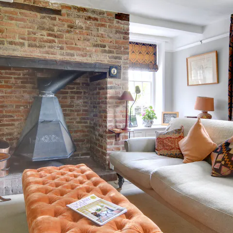 Cosy up next to the snug’s inglenook fireplace