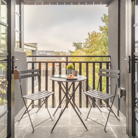 Open up a bottle of wine and enjoy a glass out on the private balcony space