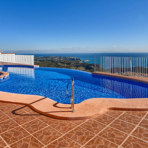 Embrace refreshing swims (with a view) in the communal pool