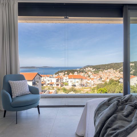 Enjoy incredible views while lounging in the bedroom