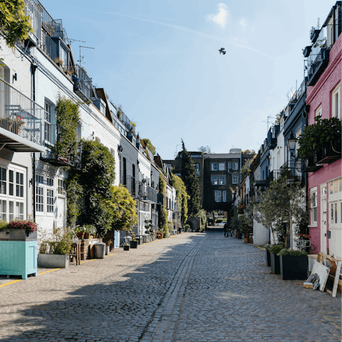 Explore the vintage boutiques in Notting Hill, just a nineteen-minute walk away