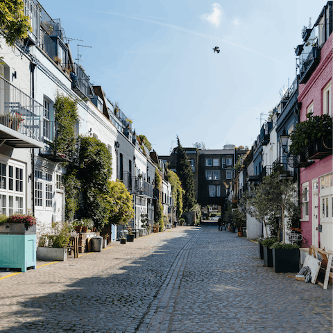 Explore the vintage boutiques in Notting Hill, just a nineteen-minute walk away