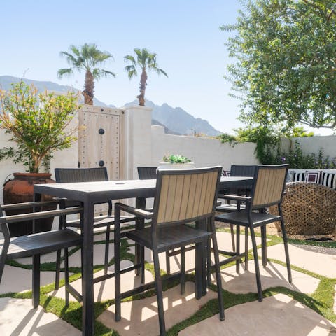 Dine outdoors while watching the sun set over the Santa Rosa mountains