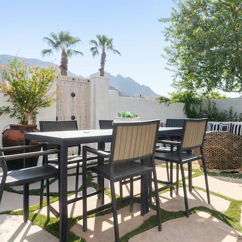 Dine outdoors while watching the sun set over the Santa Rosa mountains