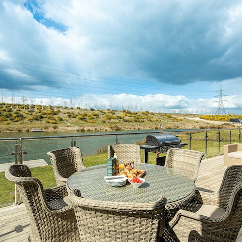 Enjoy an alfresco breakfast as you drink in the lake views