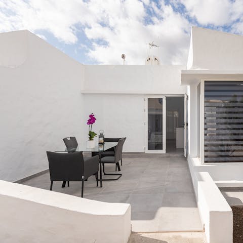 Enjoy a celebratory sundowner on the private patio