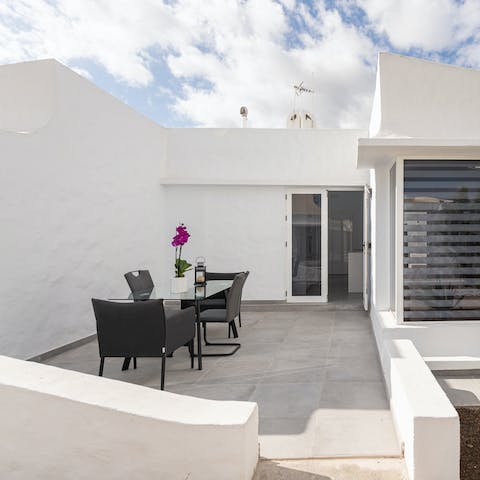 Enjoy a celebratory sundowner on the private patio