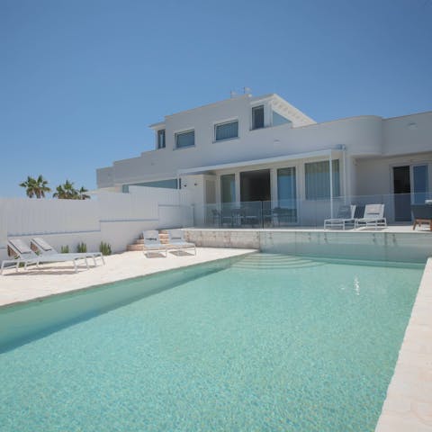 Stretch out beside the private pool and soak up the sun