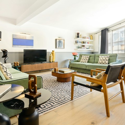 Relax in the spacious living room after a day of exploring the French ccapital