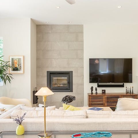 Get cosy in front of the fireplace