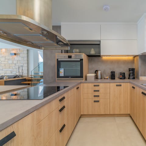 Rustle up a delicious dinner in the sleek, modern kitchen