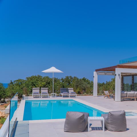 Enjoy a refreshing dip in the private pool as the Cretan sun warms your skin