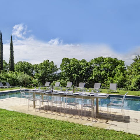 Dine poolside at the alfresco dining area
