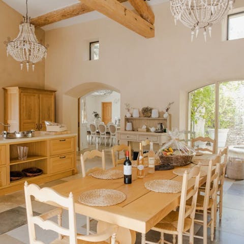 Cook together in the traditional kitchen and dine outside