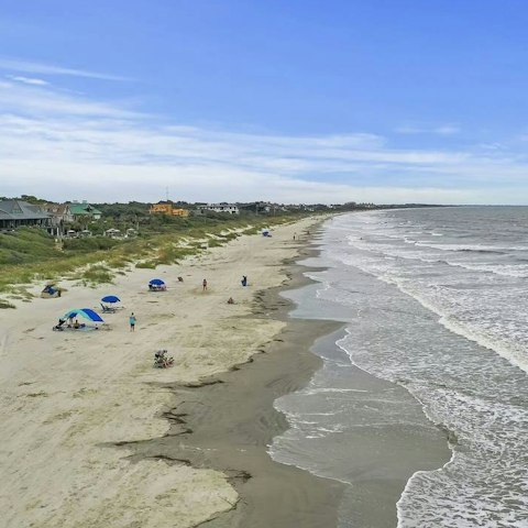 Wander down the path and right onto the beach