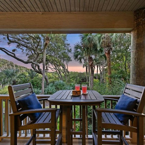 Watch the coastal sunsets on the deck, a glass of wine in hand