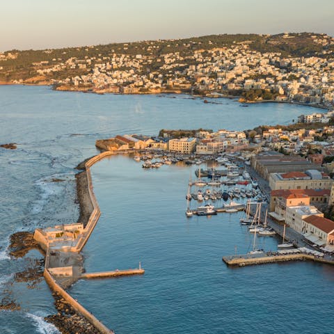Wander the historic streets of Chania – a short drive away