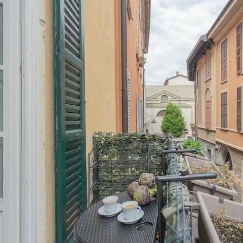 Enjoy a Prosecco on the balcony
