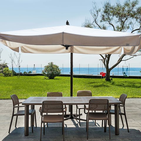 Gather beneath the shade on the terrace for an alfresco brunch