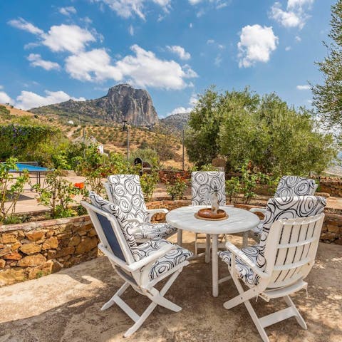 Sip on a glass of sangria on the cute, circular table