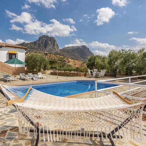 Swing in the hammock with a book on those lazy mornings
