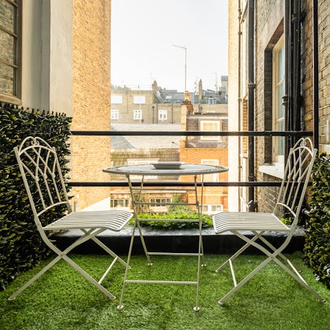 Start the day with a coffee on the private balcony