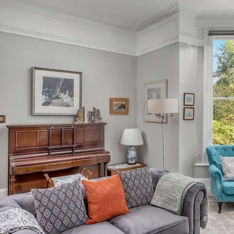 Gather round the piano in the drawing room for an impromptu family sing-song