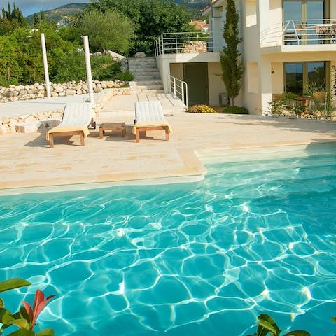 Spend hot afternoons tanning on a lounger or swimming in the pool
