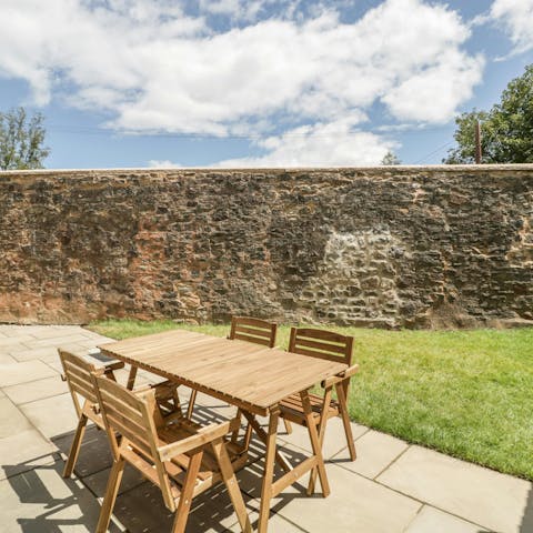 Sip an evening aperitif in the sun-kissed garden