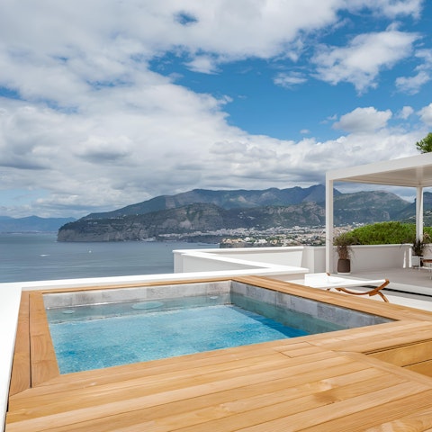 Feel on top of the world while soaking in the private hot tub