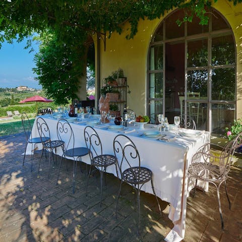 Share alfresco meals under the pergola