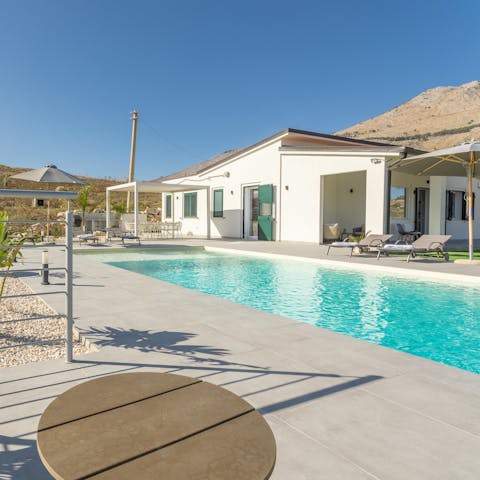 Sip Sicilian lemonade beside the salt-water pool