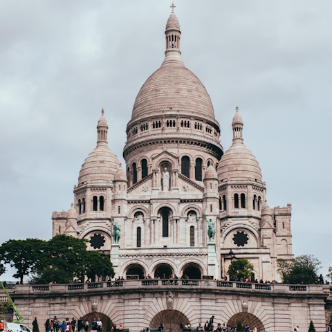 Take in sweeping city views from the Sacré-Cœur Basilica, just fifteen minutes away