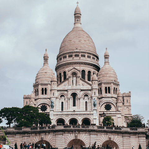 Take in sweeping city views from the Sacré-Cœur Basilica, just fifteen minutes away