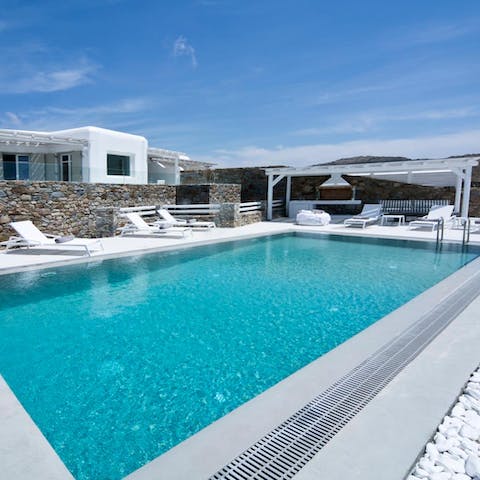 Take a dip in the refreshing swimming pool while taking in the breathtaking seascape