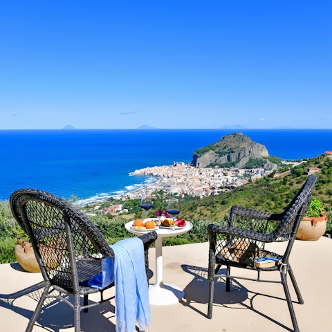 Wind down with a glass of wine overlooking the Mediterranean