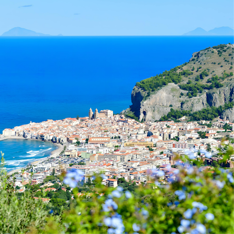 Drive fifteen minutes to the glorious beach of historic Cefalù