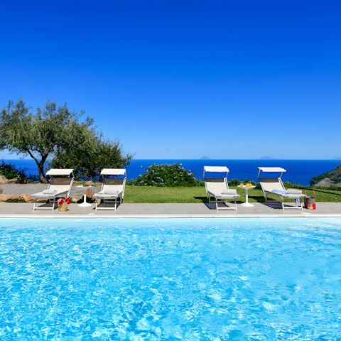 Lounge by the pool and take a dip to cool off
