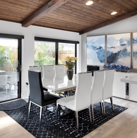 Gather around the dining table for a sociable meal