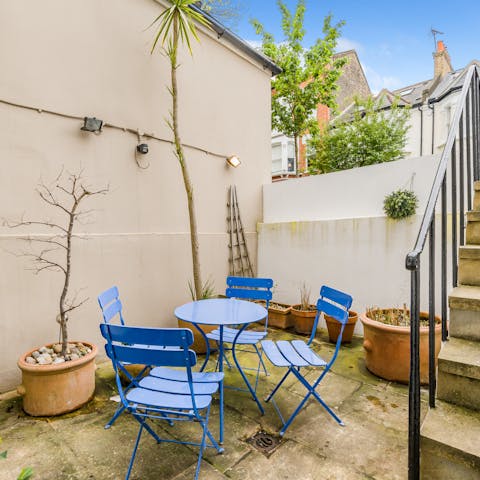 Start the morning with a cup of tea on the small patio