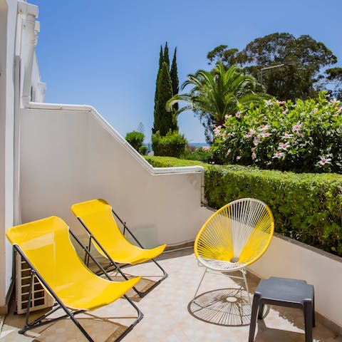 Sip coffee on the private terrace as the sun warms your skin