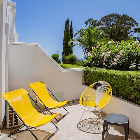 Sip coffee on the private terrace as the sun warms your skin