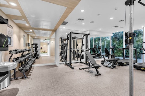 Train with a full rack of weights in the on-site gym