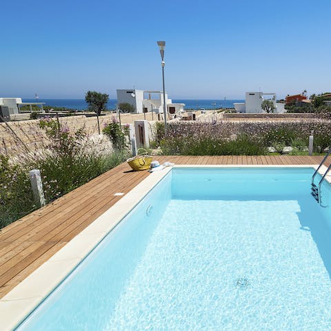 Take a dip in the pool overlooking the sea